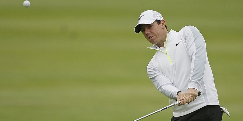 Gary Woodland Kneels Before Rory McIlroy in WGC Match Play